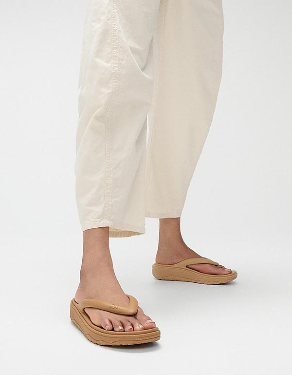 Woman wearing new relief sandals - FitFlop EU